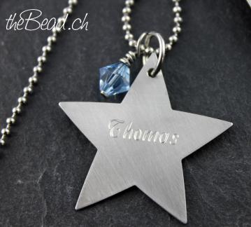 engraved star pendant