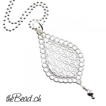 silver collier with flower of life pendant