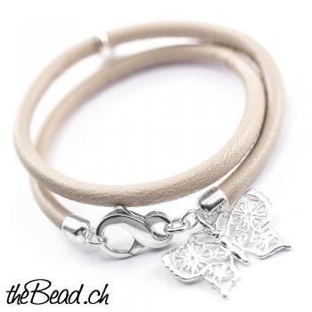 leather bracelet with butterfly pendants