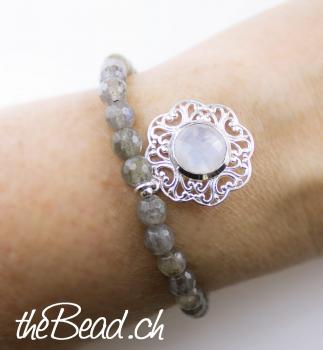 moonstone bracelet with silver pendant