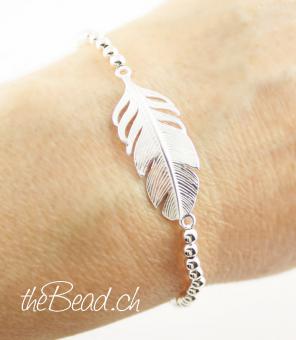 silverbracelet made with feather