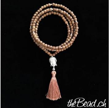 Necklace with wood beads and tassel pendant