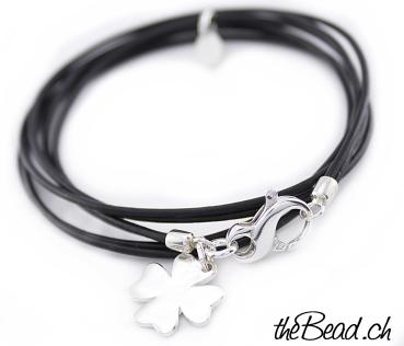 leather bracelet with glover leaf pendant