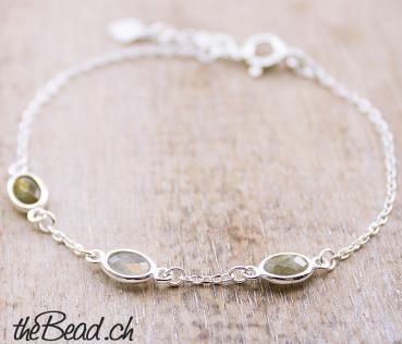 silver bracelet with olive green labradorite