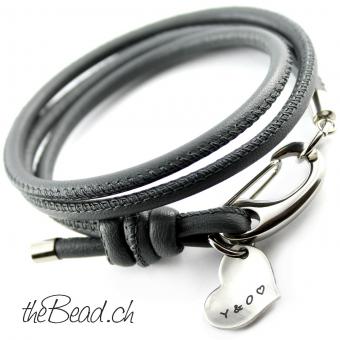 Leather bracelet with heart pendant