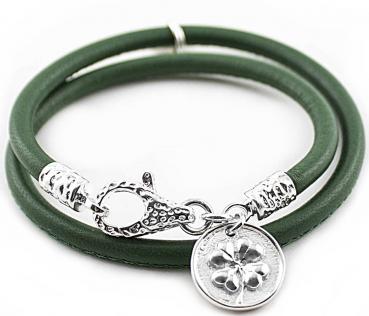 Leather bracelet with four leaf pendant