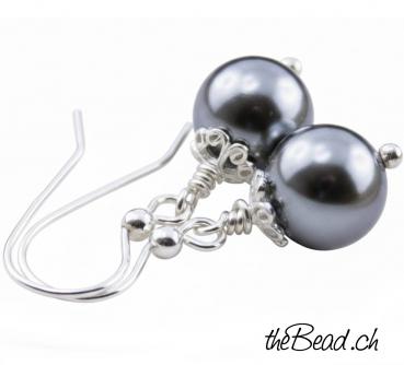 Silberohringe mit baumelnden Muschelkern Kugeln