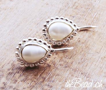 Earrings made of 925 sterling silver and pearls