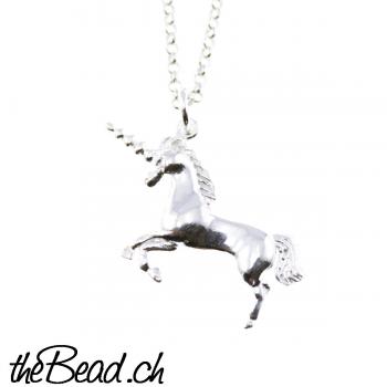 silver necklace with unicorn pendant