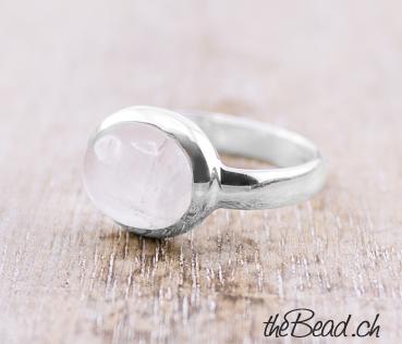 women silver finger ring made of 925 sterling silver and rainbow moonstone