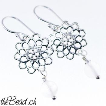 nice silver earrings with moon stone