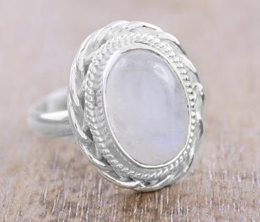 women silver finger ring made of 925 sterling silver and rainbow moonstone