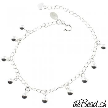 Silver bracelet with bead pendants