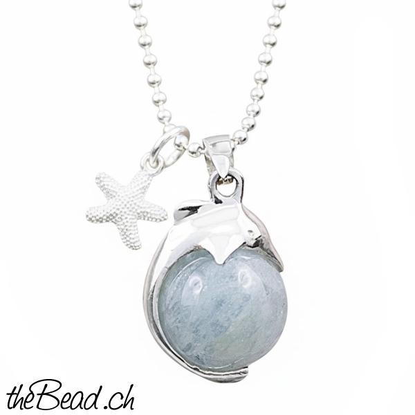 Aquamarin mit Delfin und Seestern