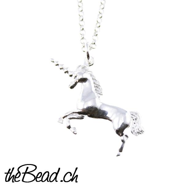 unicorn pendant with silver necklace
